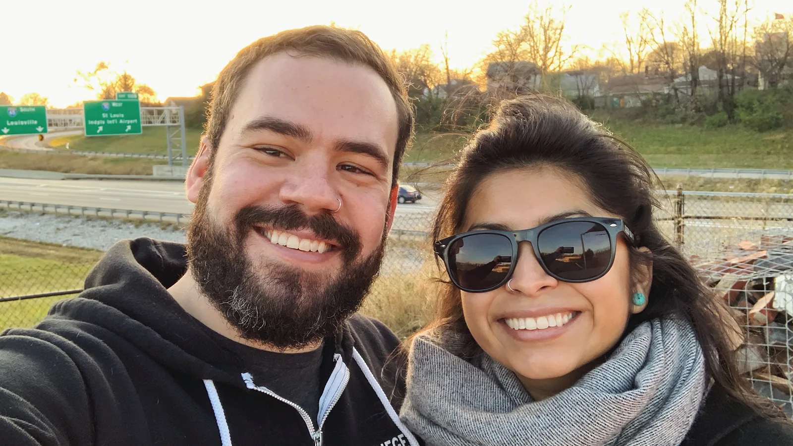 Peter and Consuelo taking a selfie outdoors on a bright winter afternoon